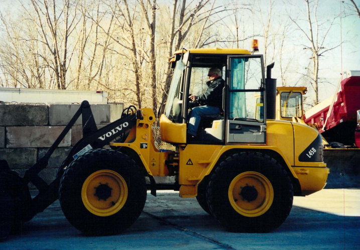 Man on Machinery working for a snow removal company in Oakland County Michigan